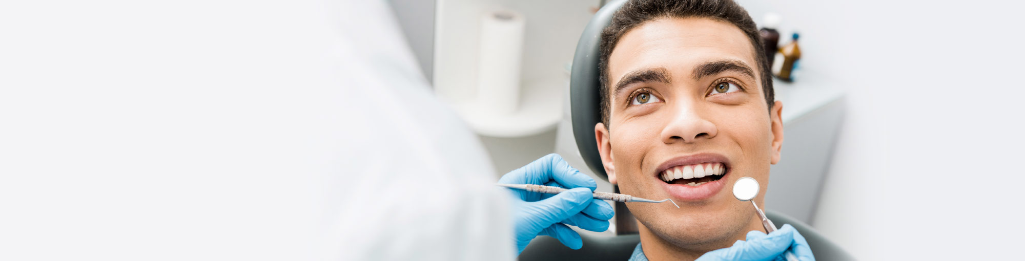 Patient Waiting For Dentist To Clean Teeth