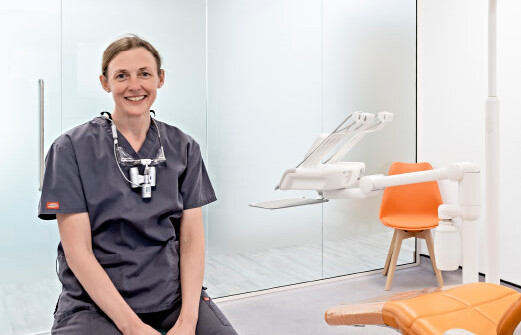 Dentist Sitting In Surgery