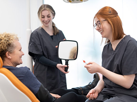 Dental Nurses Showing Patient Results